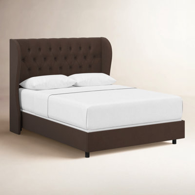 Tomey Upholstered Wingback Bed