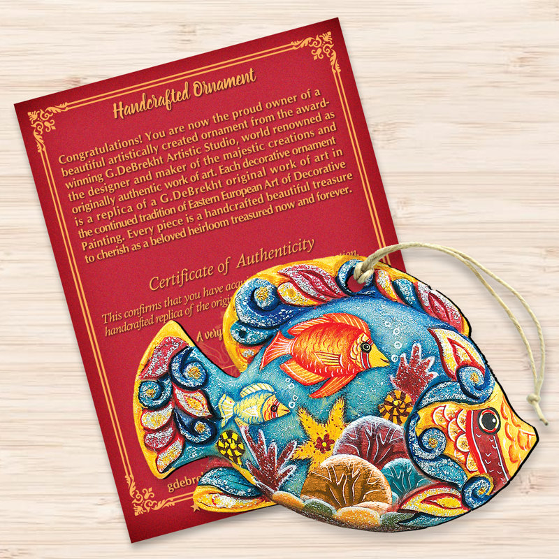Ornement en forme de poisson tropical suspendu en bois