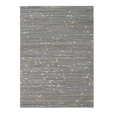 Tapis noir et blanc en cuir peau de vache