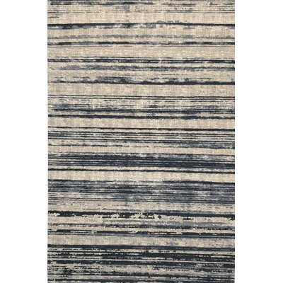 Tapis beige / noir tissé à plat