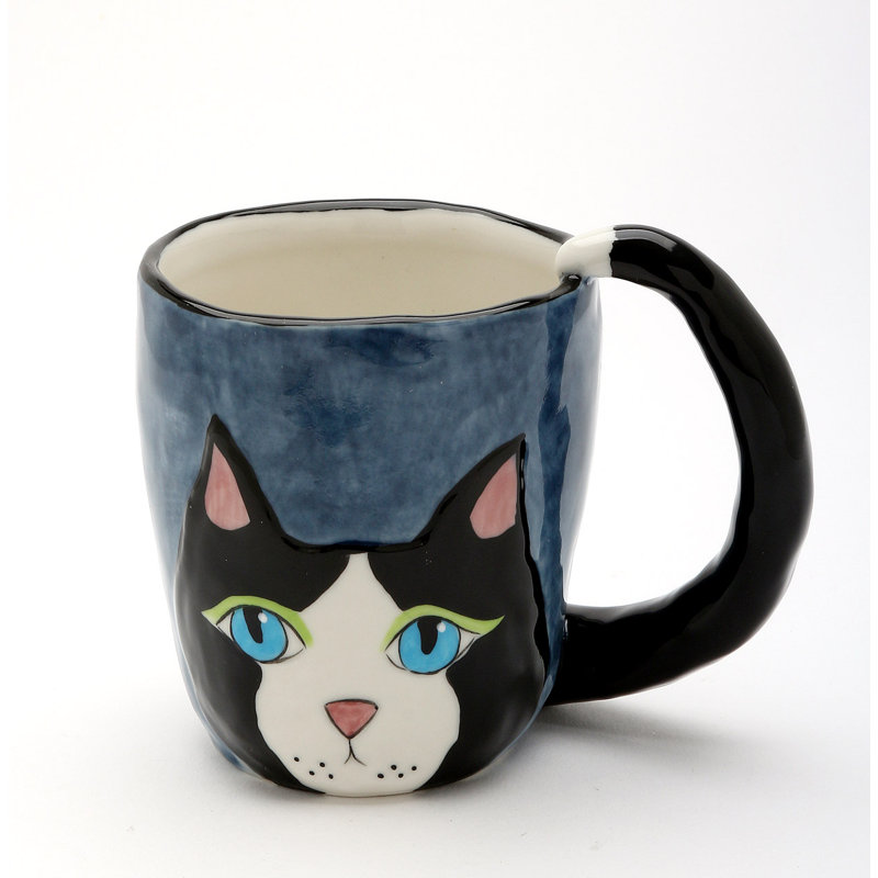Tasse de chat chats dans le placard