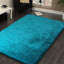 Tapis turquoise à poils longs touffeté à la main Huya-281040771
