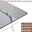 Table basse rectangulaire en verre trempé avec pattes en métal, teinte grise, idéale pour la décoration du salon et de l'espace.