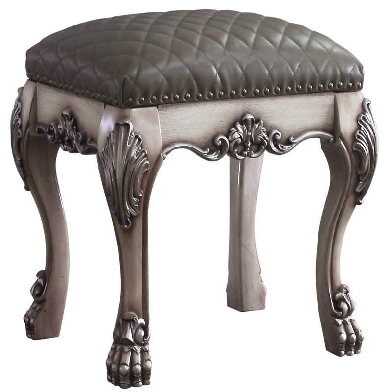 Tabouret de chambre gris et blanc rétro, ajoutant une touche classique à votre espace de mise en valeur