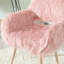 Chaise rose en fausse fourrure avec structure en métal
