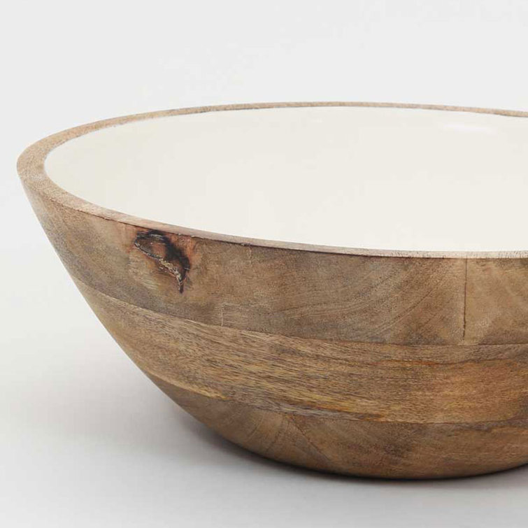 https://assets.wfcdn.com/im/81155566/resize-h755-w755%5Ecompr-r85/2315/231581465/Daquinn+Hand+Carved+Salad+Bowl+Mango+Wood+with+White+Lining.jpg