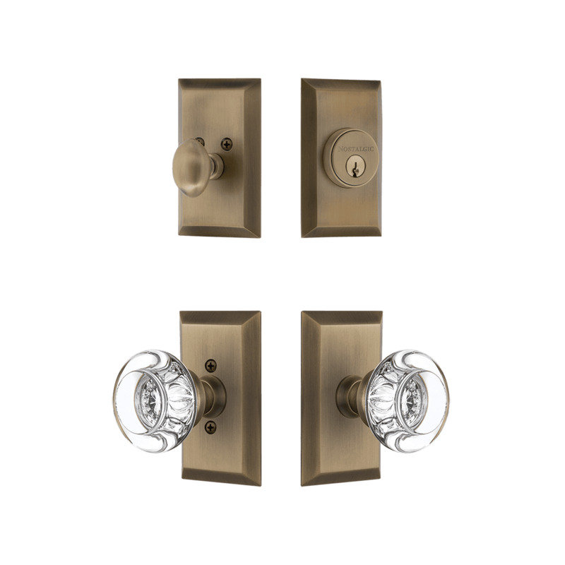 Ensemble d'entrée Nostalgic Warehouse Studio avec bouton rond en cristal transparent en laiton antique, Laiton antique