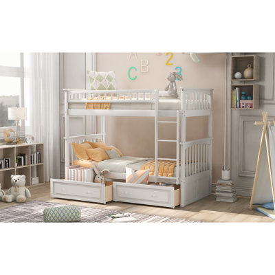 Lit simple au-dessus de lits superposés avec tiroirs en blanc
