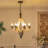 Suspended luminaire with adjustable chain