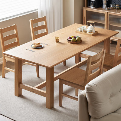 Solid wood rectangular dining table in natural wood color