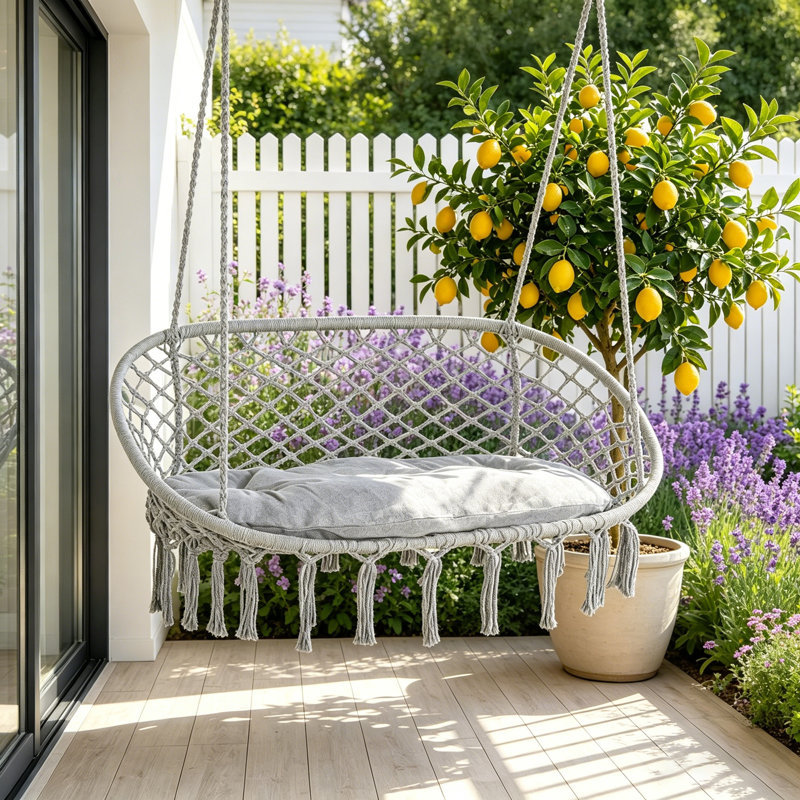 Chaise hamac pour 2 personnes avec balançoire en macramé, coussin moelleux et corde de coton suspendue pour une détente confortable en plein air