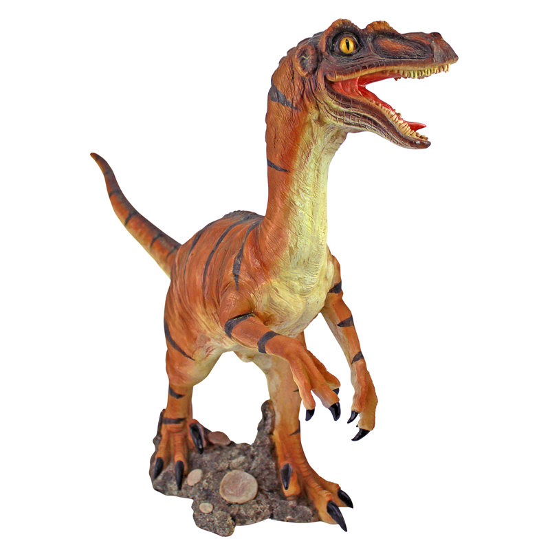 Statue de velociraptor à l'échelle de dinosaure