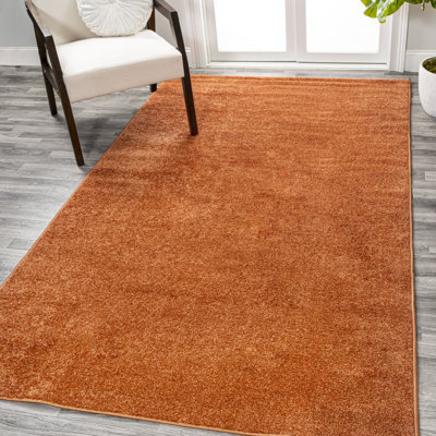 Antto Solid Low-Pile Orange Rug