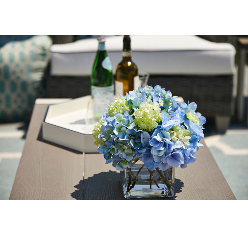 Blue Hydrangeas and Roses in Glass Vase Arrangement