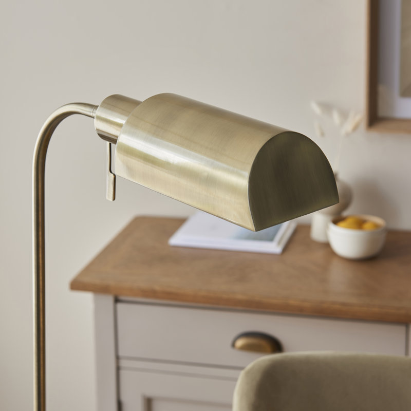 Pharmacy Reader Floor Lamp finished in Ant. Brass
