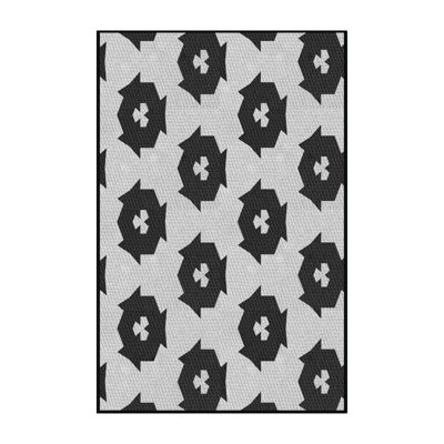 Tapis noir/beige à motifs
