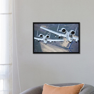 " Two A-10C Thunderbolt II Aircraft Fly In Formation " by Stocktrek Images