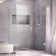 Unidoor Plus 54" W x 30.375" D x 72" H Frameless Pivot Rectangle Shower Enclosure with Fixed Panel