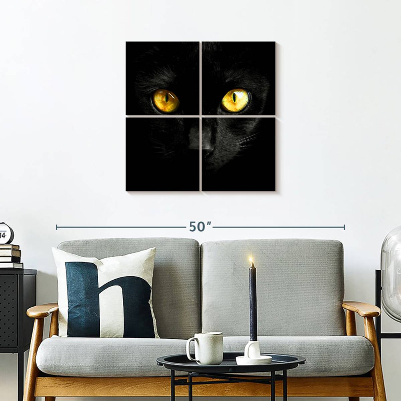 Chat noir aux yeux jaunes, H 26 po x l 26 po