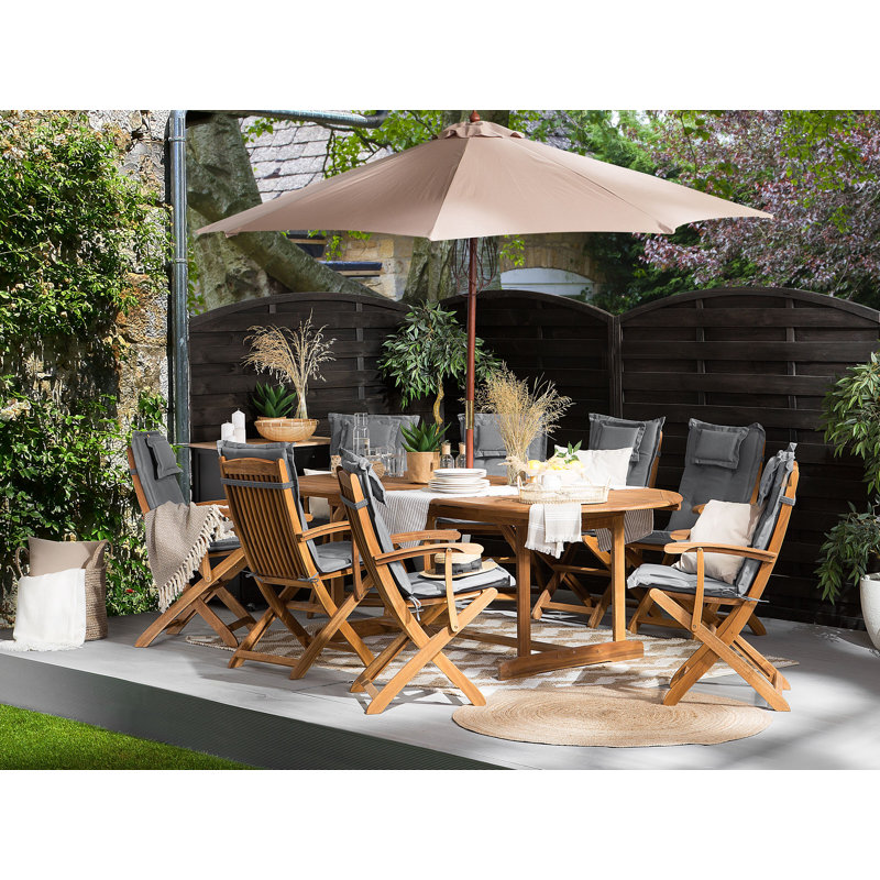 Maren 8 - Person Acacia Wood Patio Dining Set with Extendable Oval Table , Cushions Included