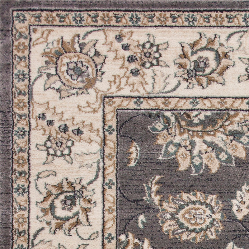 Tapis gris ou ivoire en polypropylène