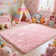 Tapis rose doux moelleux avec envers antidérapant