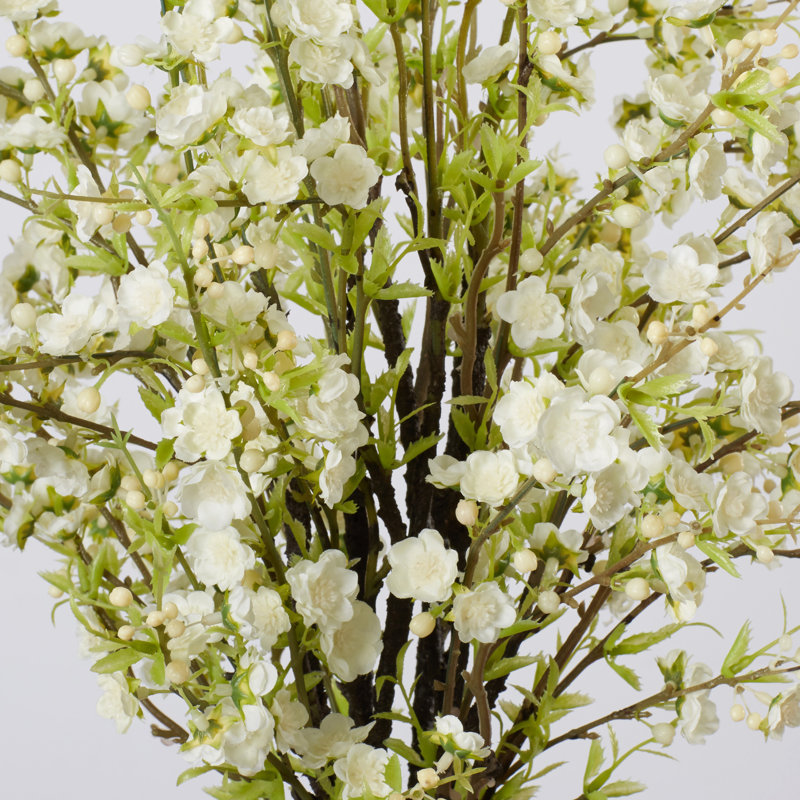 Arrangement floral à fleurs de cerises vase