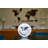 Nickel Plated Table Clock with a Quartz Time Only Movement   Dial features a world map and different time zones.