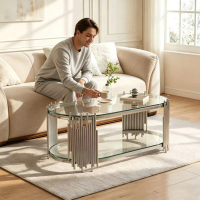 Table basse de 47 po x 23,6 po x 17,7 po avec tablettes en verre trempé à 2 niveaux, table de centre ovale moderne pour le salon, structure en acier inoxydable poli, conception artistique en «tuyau d'orgue»
