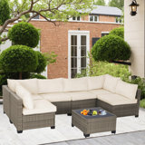 All-Weather 7-Piece Grey PE Wicker Patio Conversation Set with Beige Cushions and coffee table