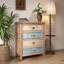 Commode vintage à 4 tiroirs avec motif en bois patiné et orné