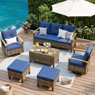 7-Person All-Weather Wicker Patio Conversation Set with Swivel Wicker Chairs, Storage Coffee Table & Multi‑Purpose Ottomans