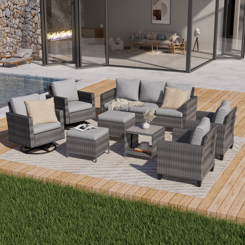 Aryen 8 Piece Outdoor Wicker Seating Group with Cushions and Rocking Swivel Chairs, Linen Gray, Gray