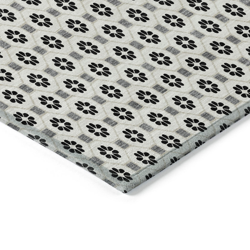 Ivory and Black Synthetic Flat Woven 10' x 14' Rug
