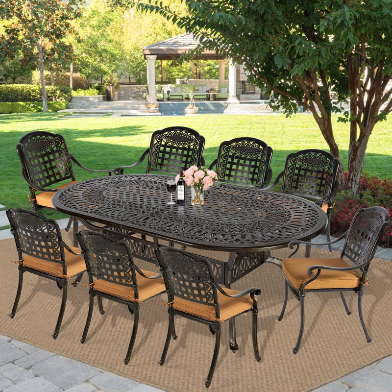Oval 8 - Person 83.8" Long Dining Set with Cushions, Khaki, 9 Pieces: Table, 8 Chairs