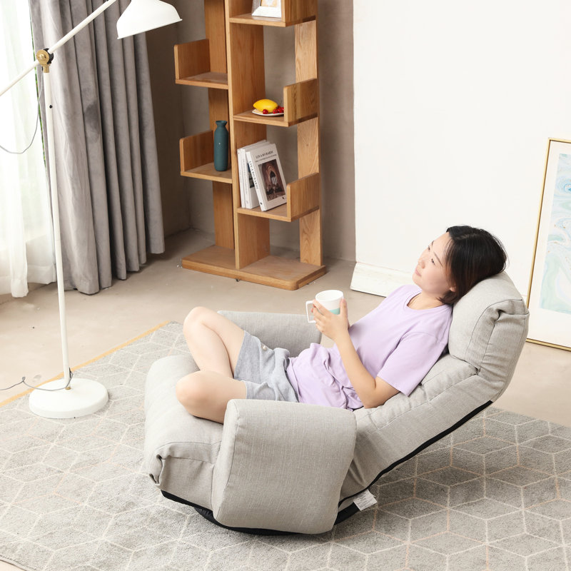 Chaise longue relaxante avec ressort intégré et base de jeu stable à 5 angles réglables avec rotation à 360 degrés