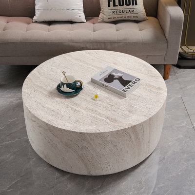 Table basse tambour en oxyde de magnésium clair à finition travertine, résistante aux intempéries et polyvalente pour une utilisation intérieure et extérieure