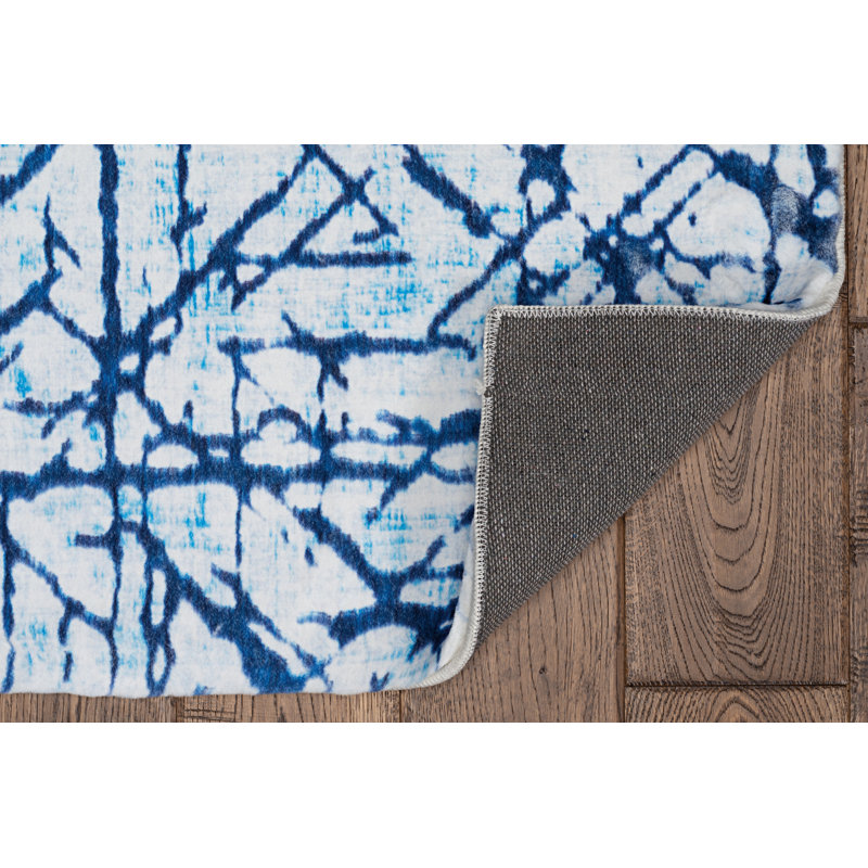 Antaniyah Faux Rabbit Fur Hand Tufted Rug, Rectangle 5' x 7'
