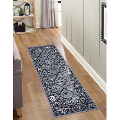 Tapis géométrique bleu / ivoire / bleu marine / bleu clair Hartle