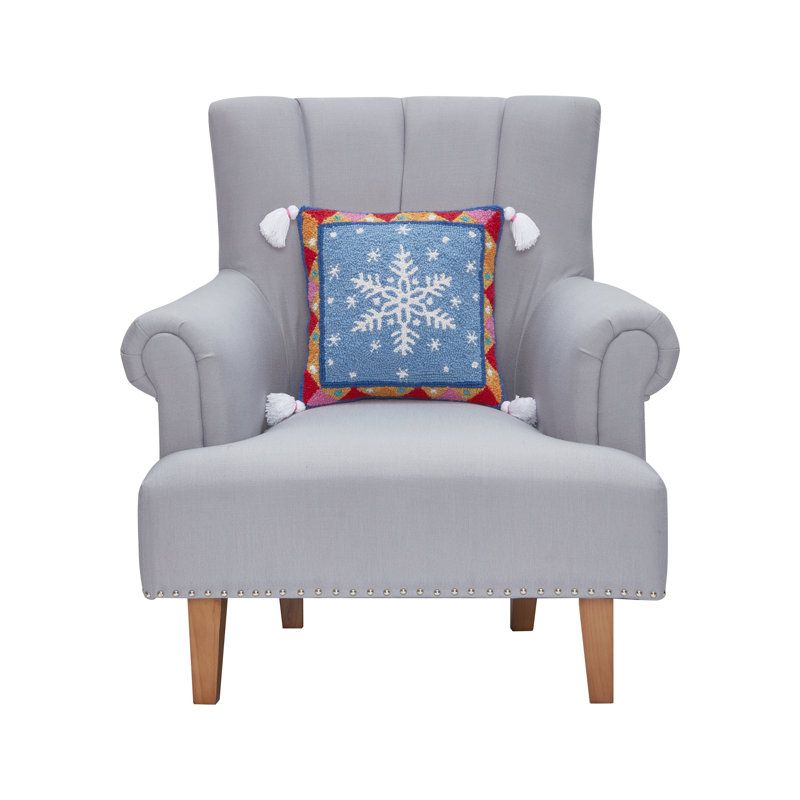 Coussin en laine crocheté à motif flocon de neige Fair Isle avec pompons