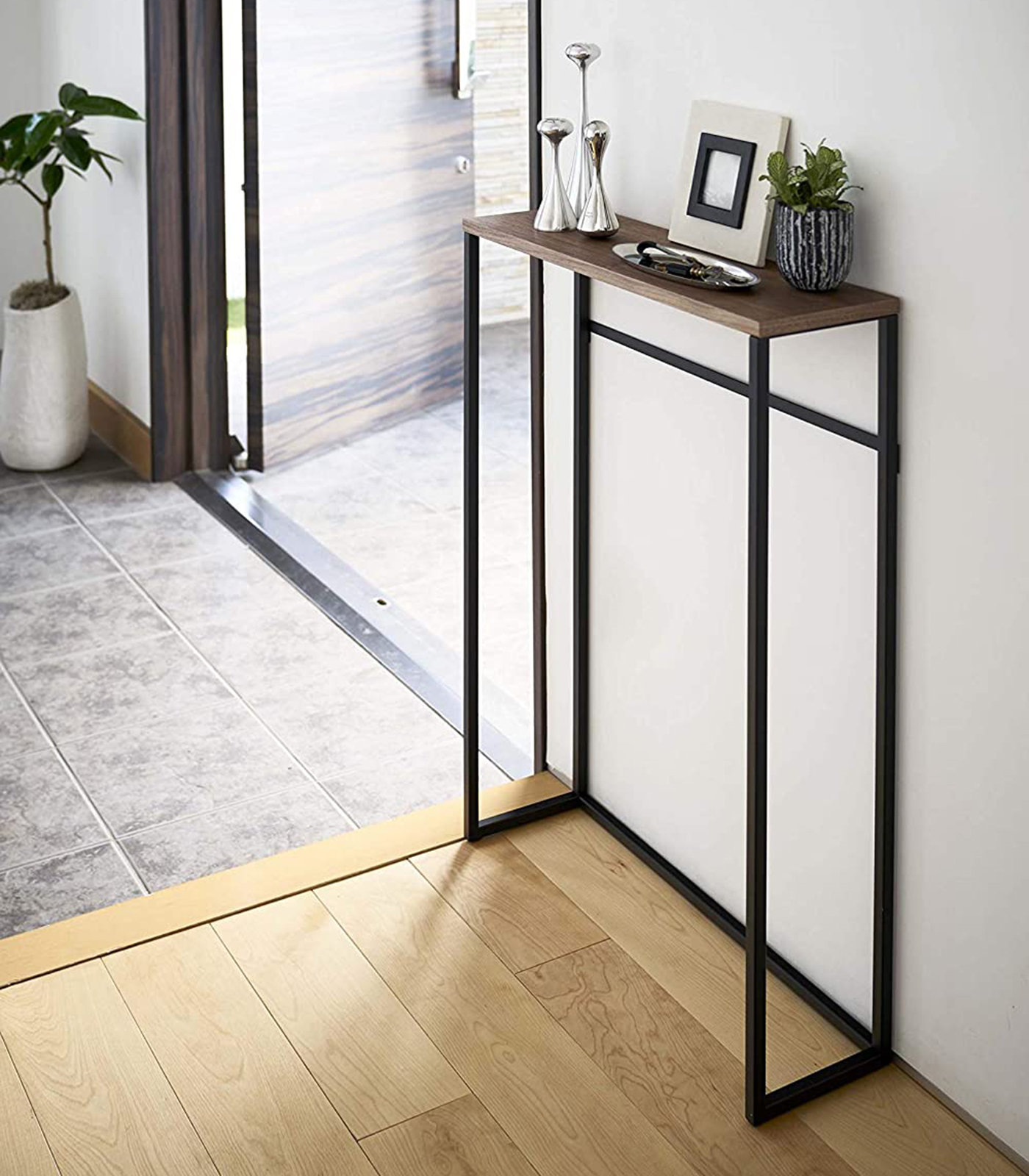 https://assets.wfcdn.com/im/81318286/compr-r85/2275/227508015/tower-yamazaki-home-slim-console-table-narrow-accent-table-for-entryway-living-room-steel-wood.jpg
