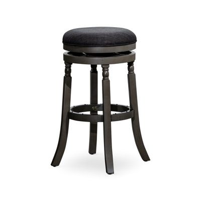 Tabouret de bar gris vieilli de 76 cm, assise en tissu anthracite, construction robuste, pivotant à 360°, diamètre de 43 cm. Ce tabouret, confortable et doté d'un mécanisme pivotant, est idéal pour la cuisine ou le comptoir.
