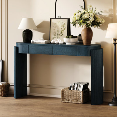 Console d'entrée en bois naturel, pieds cannelés, 2 tiroirs, de couleur bleu marine. Parfait pour l'entrée et le salon. Finition sophistiquée.