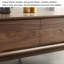 Table basse moderne et minimaliste en bois massif avec rangement-927611613