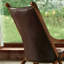 Chaise berçante rétro en bois massif