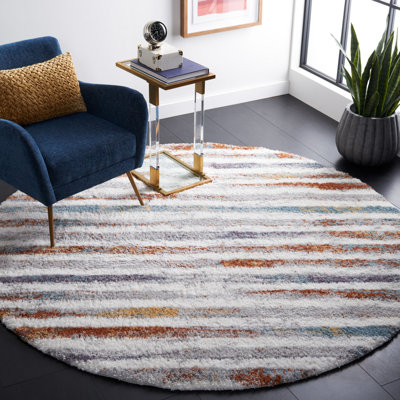 Joua Striped Blue Rust/Ivory Area Rug