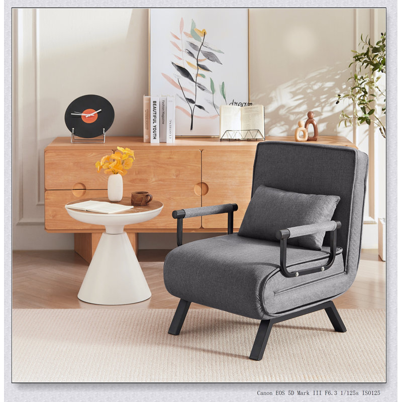 Chaise pliante multifonctionnelle avec dossier et coussin réglables pour une assise et un sommeil confortables, parfaite pour les petits espaces et polyvalente.