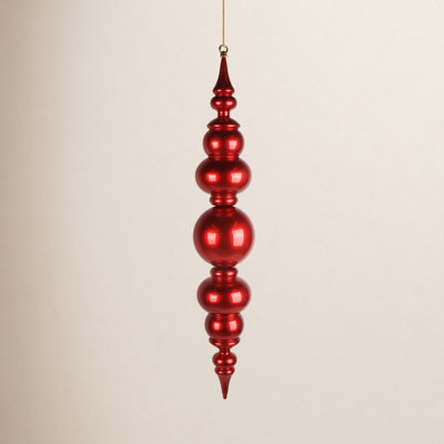 Vickerman 34" Red UV Candy Ball Drop Finial. This large ornament features a stunning candy apple finish and is UV-rated for outdoor use. It measures 34 inches tall.