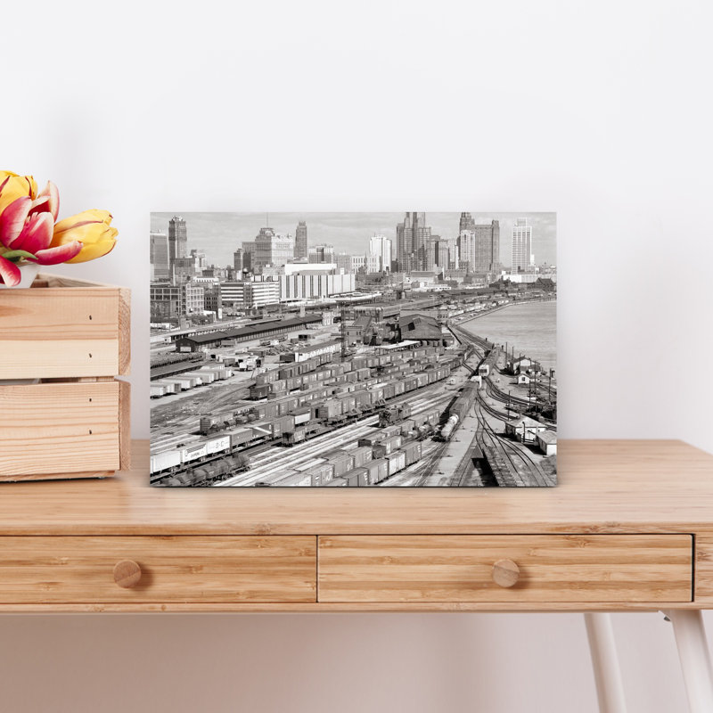 1960s INDUSTRIAL FREIGHT TRUCKING AND RAILROAD BOXCAR TRAIN YARDS ALONG RIVER CITY BUILDINGS SKYLINE IN B G DETROIT MICHIGAN USA 1 Piece Wrapped Canvas Wall Art