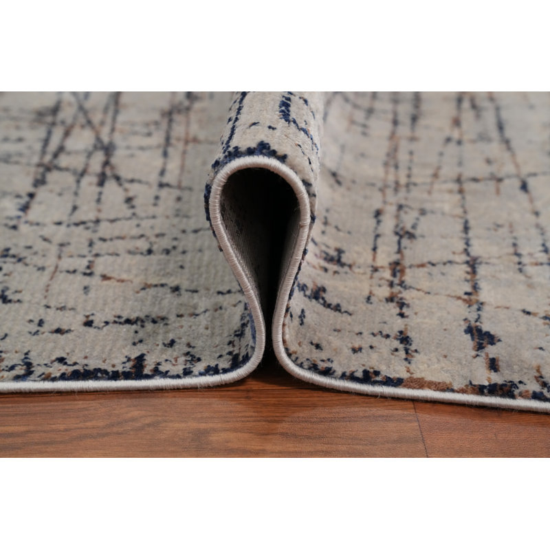 Élégant tapis 5 x 7 avec des motifs abstraits complexes